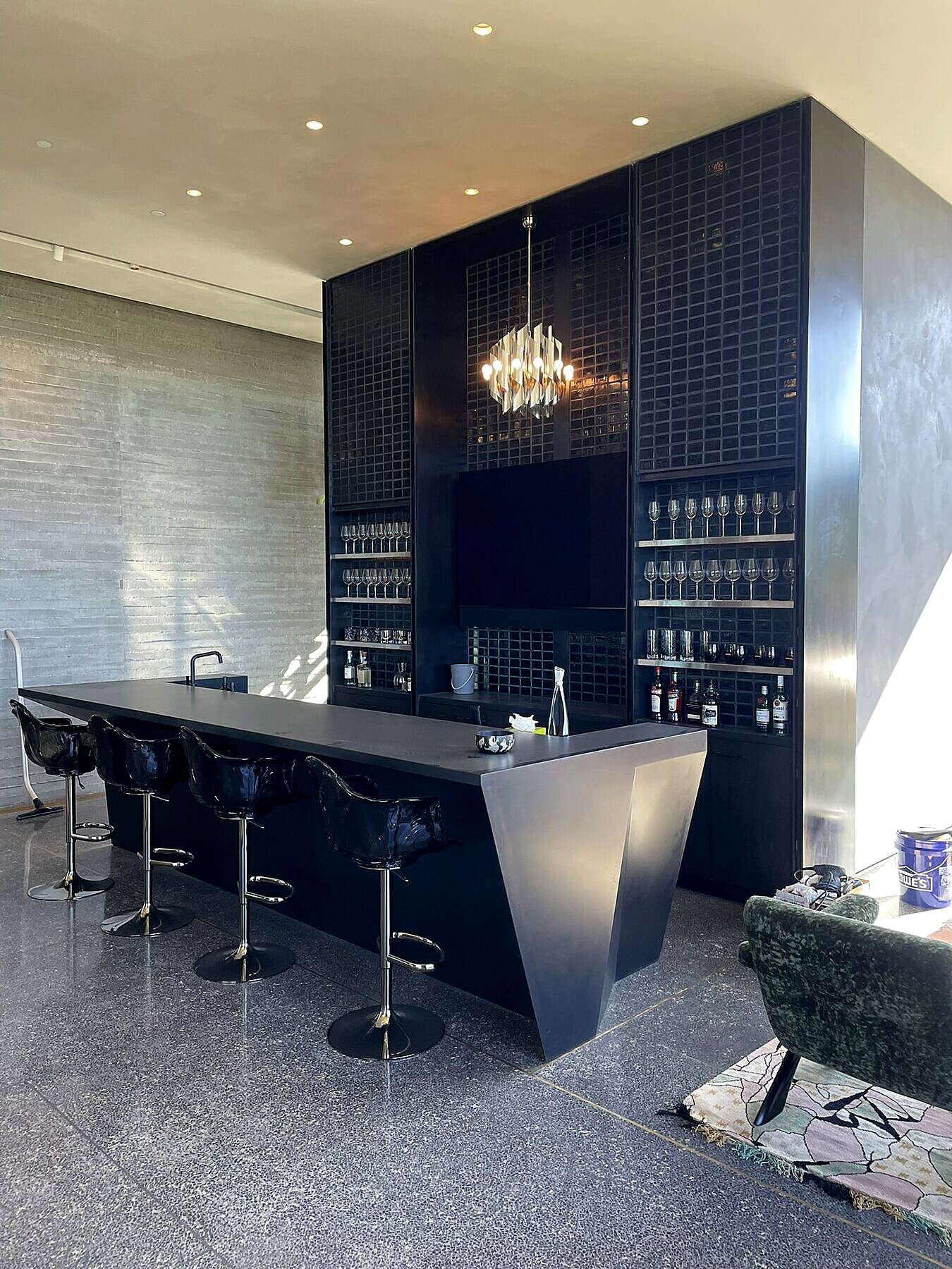 Blackened steel fin panels, wine room and bar installation