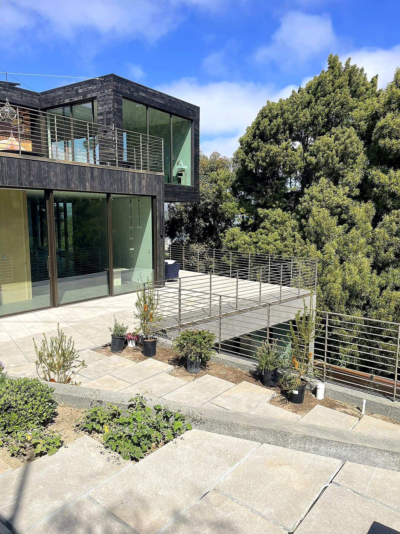 Stainless steel cable railing, coastal exterior detail